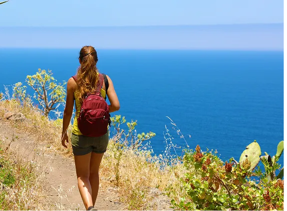 woman hiking with view